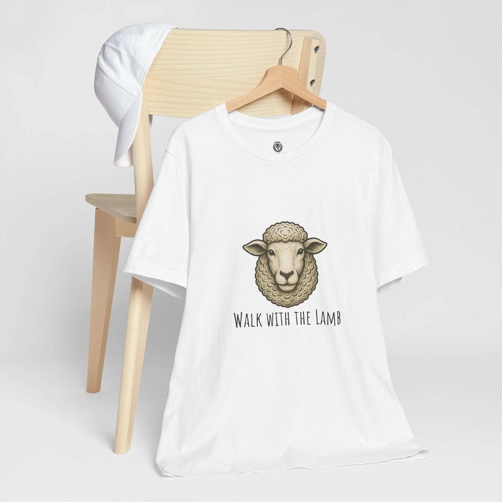 Religious graphic tees for moms and kids featuring a lion and lamb design with spiritual quotes