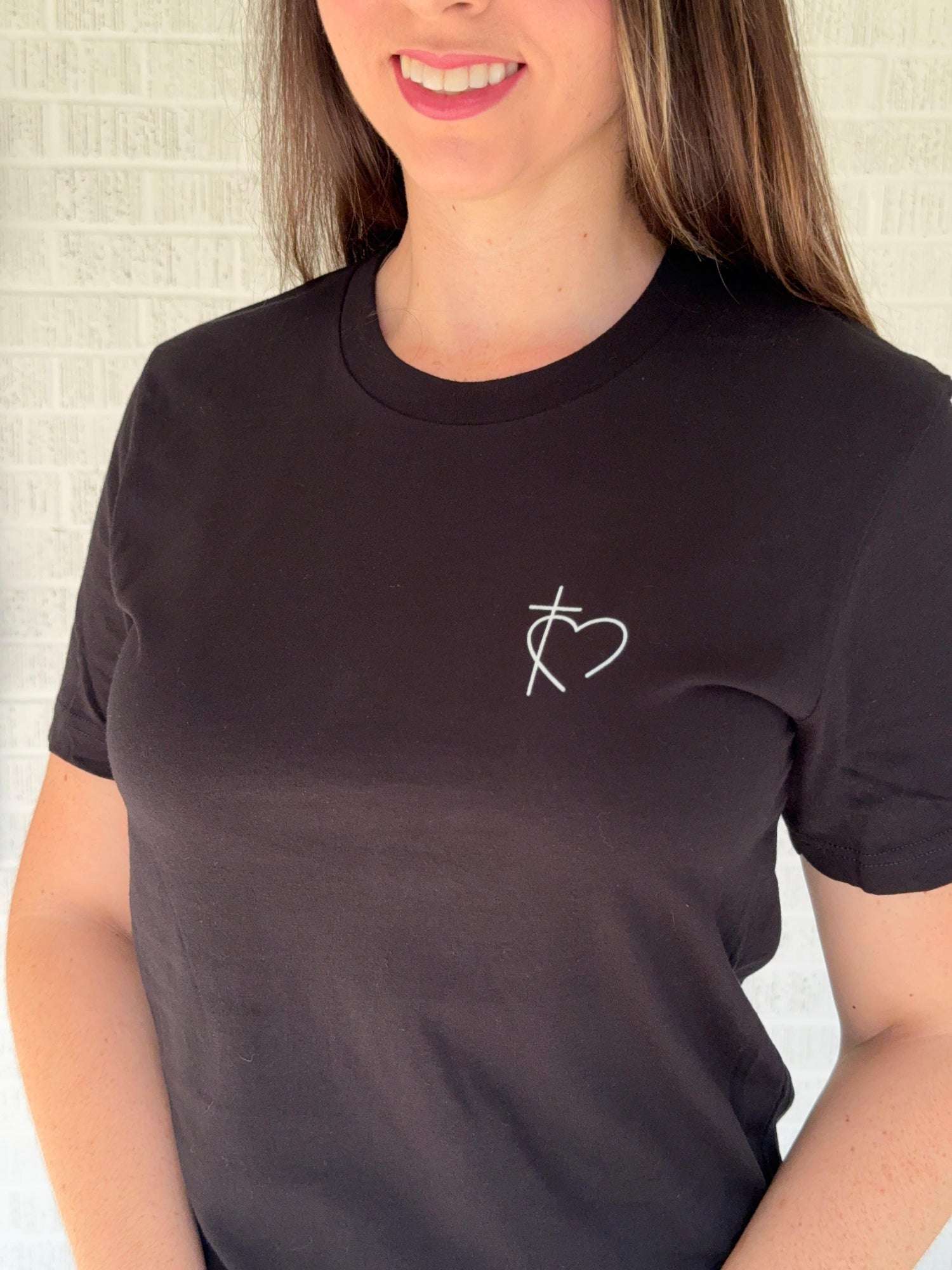 Christian t-shirts featuring heart and cross design