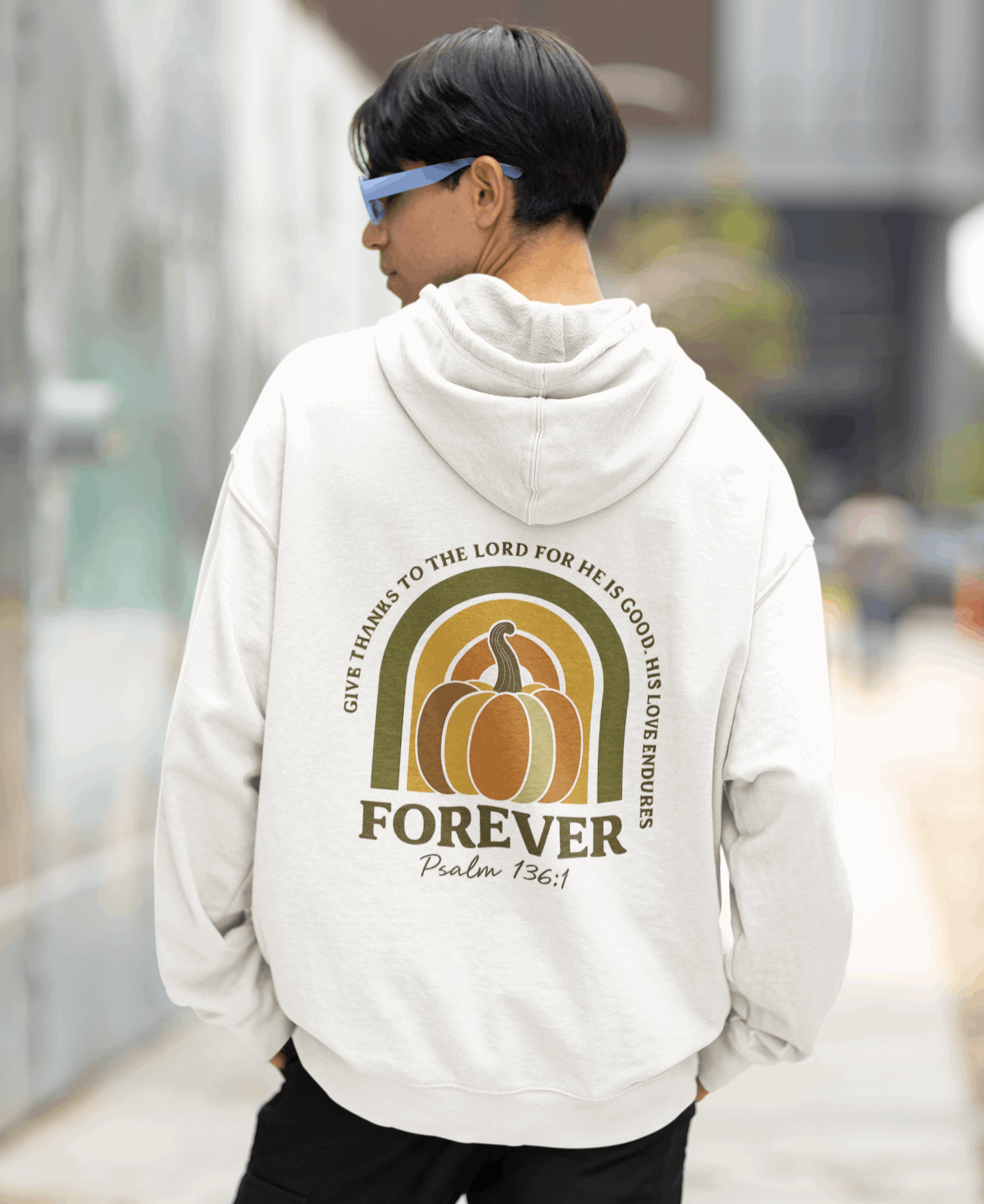 Christian hoodie with Psalm 136:1 "Give thanks to the Lord" pumpkin design