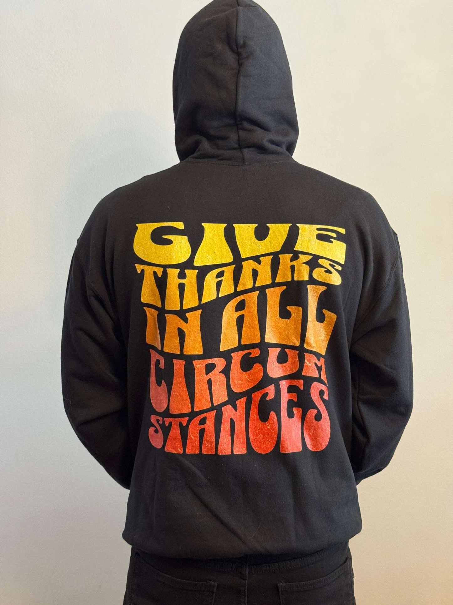 men wearing Give Thanks in All Circumstances Fall Hoodie - Holy Looks
